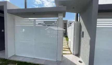Casa 2 quartos, 2 suítes e garagem.