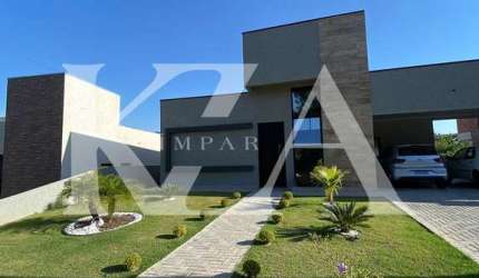 Casa recém-construída no Residencial Lagos de Jarinu com 210m², 3 suítes, terreno de 608m², 4 vagas e lazer completo. Permuta por apto até R$ 800 mil.