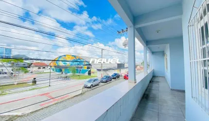 Imóvel Comercial com Duas Frentes e Terreno Amplo no Centro de Navegantes