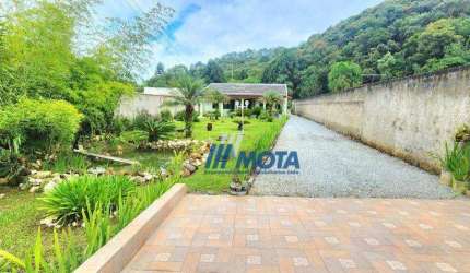 Chácara à venda Colombo, Casa sede com área 180,00m2, tanque rio, frente para asfalto, 3.239,60m2