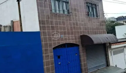 Imovel com 3 casas e 2 vagas de garagem - Jd. Dourado - Guarulhos