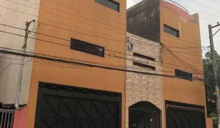 terreno com 11 casas construídas