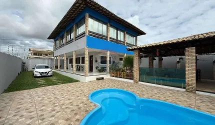 Casa com 03 Quartos e área de lazer com piscina na Praia de Cotovelo: