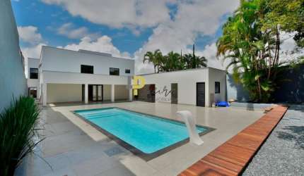 Luxo e Conforto no Jardim Botânico: Casa de 5 Suítes com 815m² e Área de Lazer Completa,