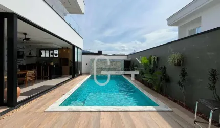 Casa com 4 dormitórios à venda, 320 m² por R$ 2.500.000,00 - Condomínio Flora Rica - Peruíbe/SP