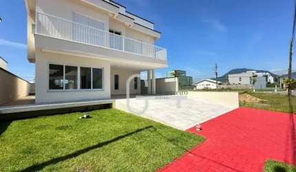 Casa com 4 dormitórios à venda, 255 m² por R$ 1.765.000,00 - Condomínio Flora Rica - Peruíbe/SP