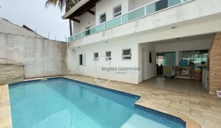 Casa com 4 dormitórios à venda, 179 m² por R$ 900.000,00 - Parque Turístico - Peruíbe/SP