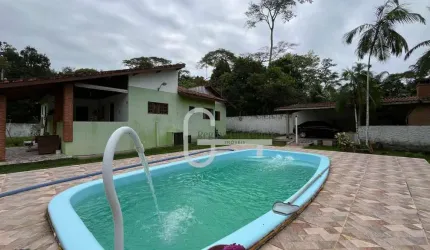 Casa com 4 dormitórios à venda, 217 m² por R$ 990.000,00 - Condomínio Residencial São Marcos - Peruíbe/SP