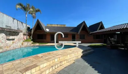 Casa com 4 dormitórios à venda, 153 m² por R$ 850.000,00 - Balneário Três Marias - Peruíbe/SP