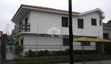 Casa com 4 quartos à venda na Rua Felisberto Pereira, 167, Jardim Itu Sabará, Porto Alegre por R$ 1.000.000