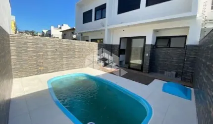 Casa com 3 quartos à venda na Rua Lagoa do Peixe, 91, Sarandi, Porto Alegre por R$ 980.000