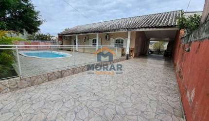CASA COM PISCINA NO BALNEÁRIO PRAIA DE LESTE