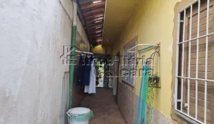 Casa para Venda em Praia Grande, Flórida, 2 dormitórios, 1 suíte, 2 banheiros, 2 vagas