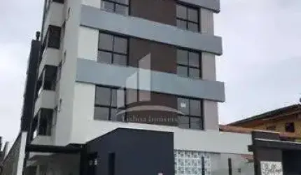 Apartamento com sacada com churrasqueira e suíte no Costa e Silva.