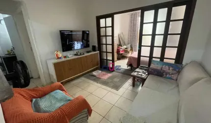 Apartamento com 2 dormitórios e 2 banheiros no 2 andar na quadra da praia à venda, 74 m² por R$ 350.000 - José Menino - Santos/SP