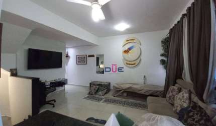 Village triplex com 2 suítes e 2 vagas à venda, 105 m² por R$ 484.000 - Macuco - Santos/SP