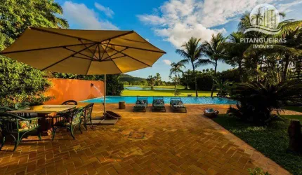 Pernambuco - Sala de estar com duplo ambiente, ampla varanda com sofás, 4 suítes e 8 vagas.
