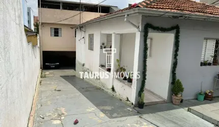 Terreno 200 m² com 3 casas no quintal por R$700.000