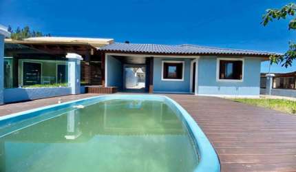 Casa em condomínio fechado com 3 quartos à venda na Heitor Villa Lobos, 134, Arpoador, Xangri-Lá por R$ 750.000