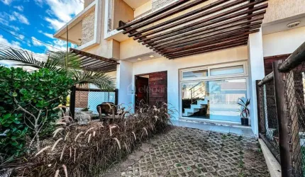 Casa em condomínio fechado com 3 quartos à venda na Rua Rio da Várzea, 35, Centro, Xangri-Lá por R$ 690.000