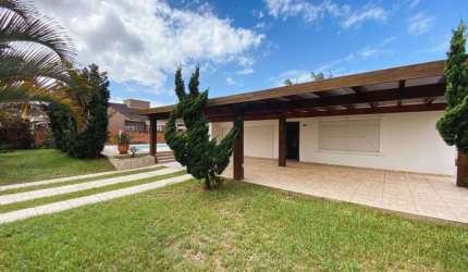 Casa em condomínio fechado com 3 quartos à venda na Guatapi, 688, Atlântida, Xangri-Lá por R$ 986.000
