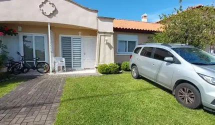 Casa em condomínio fechado com 3 quartos à venda na Central, 1001, Noiva Do Mar, Xangri-Lá por R$ 920.000