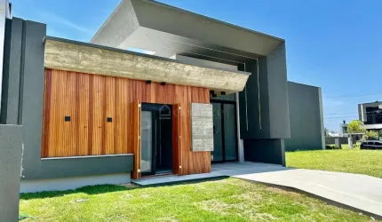 Casa em condomínio fechado com 4 quartos à venda na Rua Rio Camisas, 12, Centro, Xangri-Lá por R$ 1.450.000