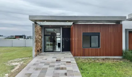 Casa em condomínio fechado com 4 quartos à venda na Rua Rio Camisas, 231, Centro, Xangri-Lá por R$ 1.690.000