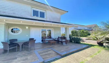 Casa em condomínio fechado com 4 quartos à venda na Avenida Paraguassu, 20, Centro, Xangri-Lá por R$ 1.350.000
