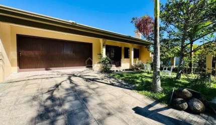 Casa em condomínio fechado com 3 quartos à venda na Vital Brasil, 443, Arpoador, Xangri-Lá por R$ 620.000
