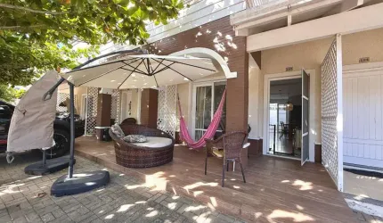 Casa em condomínio fechado com 2 quartos à venda na Avenida Paraguassu, 20, Centro, Xangri-Lá por R$ 830.000