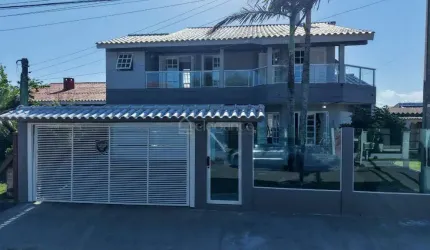 Casa com 5 quartos à venda na Rua Cassiterita, 327, Rainha do Mar, Xangri-Lá por R$ 1.200.000