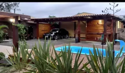 Casa com 3 quartos à venda na Dos Lírios, 502, Noiva Do Mar, Xangri-Lá por R$ 950.000