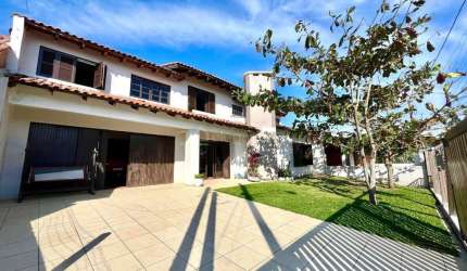 Casa em condomínio fechado com 5 quartos à venda na Rua Dos Corais, 447, Centro, Xangri-Lá por R$ 650.000