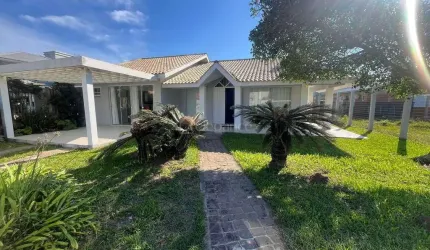 Casa em condomínio fechado com 4 quartos à venda na Rua Sol E Mar, 123, Centro, Xangri-Lá por R$ 990.000