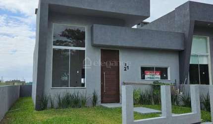 Casa em condomínio fechado com 2 quartos à venda na Rs 389, Estrada do Mar, 27, Santorini, Xangri-Lá por R$ 480.000