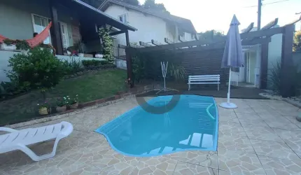 Casa com 2 dormitórios(suíte) e piscina à venda, 164 m² por R$ 605.000 - Renascença - Santa Cruz do Sul/RS