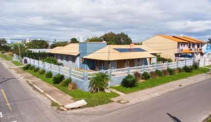 Casa a venda no Centro de Imbé, 3 terrenos, 5 suítes, piscina aquecida, jacuzzi.