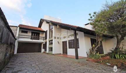 Casa para Venda - 320m², 4 dormitórios, sendo 1 suites, 3 vagas - Cavalhada