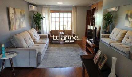 Excelente casa com 03 suíte, espaço gourmet com churrasqueira, living com lareira, pátio com piscina e garagem para 02 carros no bairro Espírito Santo