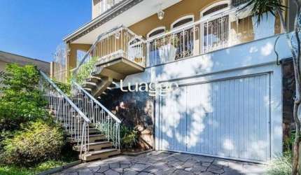 Excelente casa de 264m² com 4 dormitórios no bairro Menino Deus