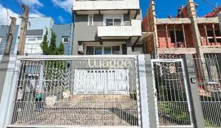 Casa em Porto Alegre, no bairro Hípica, com 3 dormitório(s), e 3 banheiros, à venda.