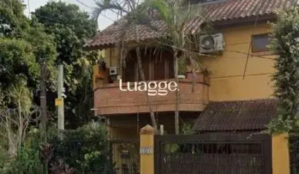 Casa Condominio em Porto Alegre, no bairro Guarujá, com 3 dormitório(s), e 3 banheiros, à venda.