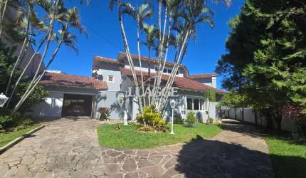 Casa em Porto Alegre, no bairro Ipanema, com 3 dormitório(s), à venda.