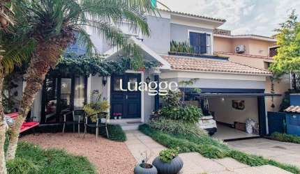 CASA DE 4 DORMITÓRIOS EM CONDOMÍNIO - 320 m² - 4 VAGAS DE GARAGEM