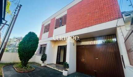 VENDA DE CASA DE 4 QUARTOS COM  VAGAS DE GARAGEM - MENINO DEUS