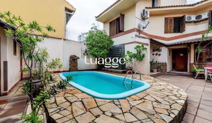 Casa com 3 suítes e 4 vagas no Bairro Boa Vista