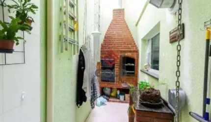 Sobrado com 3 dormitórios à venda, 144 m² por R$ 650.000,00 - Jardim das Maravilhas - Santo André/SP