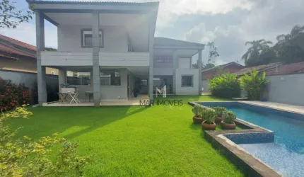 Casa em condomínio Fechado na praia de Pernambuco no Guarujá com 5 suítes