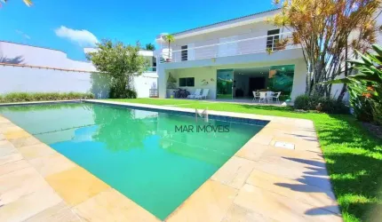 Linda casa em condomínio fechado de alta padrão a 200 metros da praia de Pernambuco no Guarujá!
